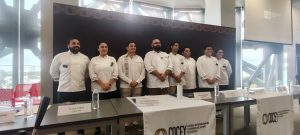 Autoridades, chefs y representantes del sector culinario durante la presentación oficial del COCEY en el Gran Museo del Mundo Maya.